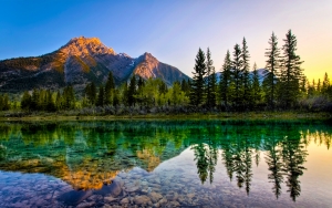 lake with mountain in the background