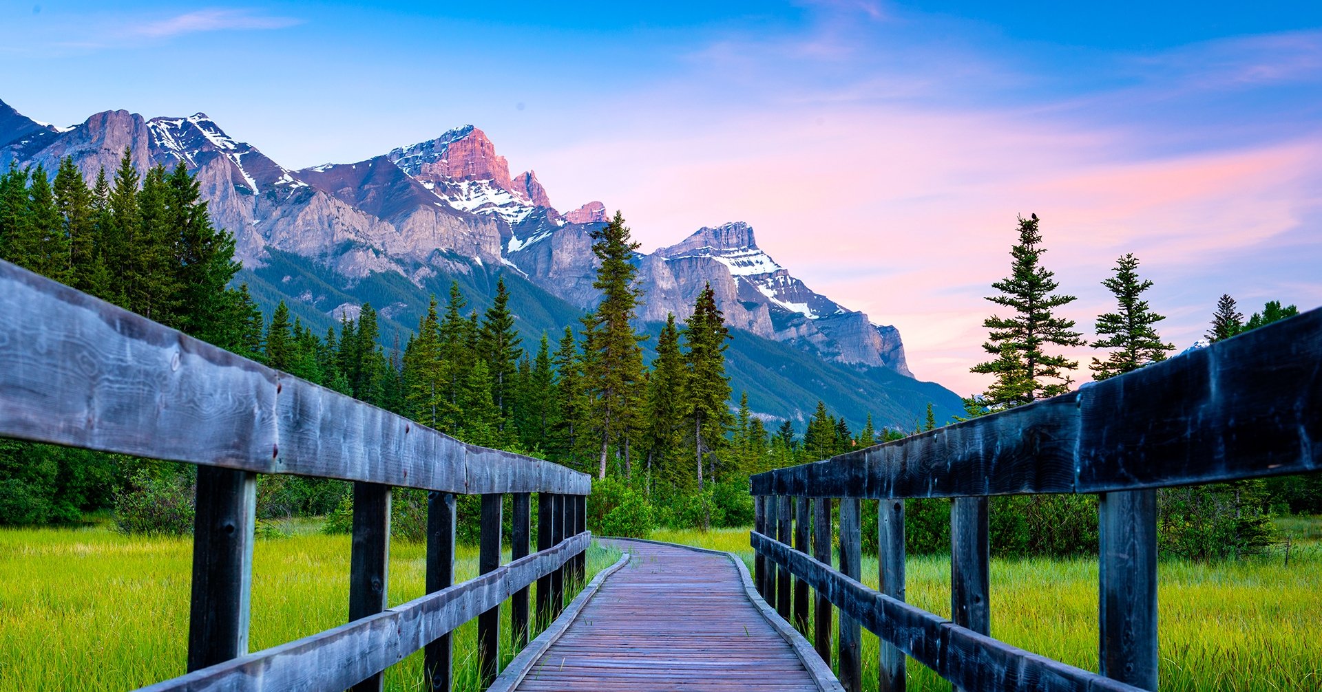 policeman's creek boardwalk with mountains in the distance at sunset