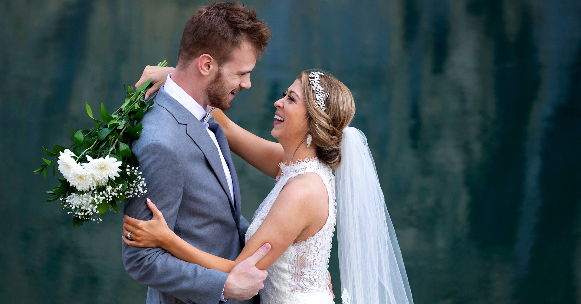 a bridge and groom posing for wedding photos