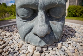 the big head sculpture in canmore