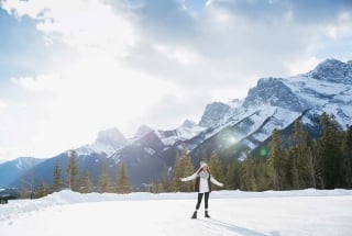 a woman ice skating at the canmore nordic centre in the spring