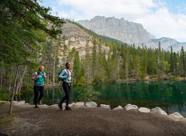 a mother and daughter hiking grassi lakes trail