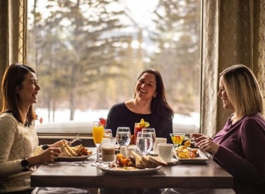a group of woman enjoying brunch at stirling lounge and grill