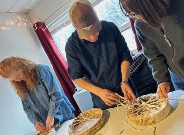 People participating to the Drum Making Workshops of Listen Studios