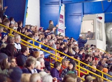 Spectators at a Canmore Eagles hockey game
