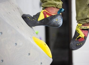 The feet of a wall climber