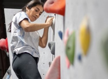 A climber on a climbing wall