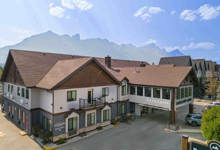 basecamp lodges canmore in the summer with Rundle Range in the background