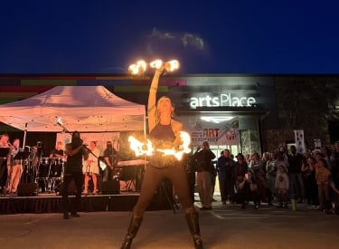 A person juggling with fire