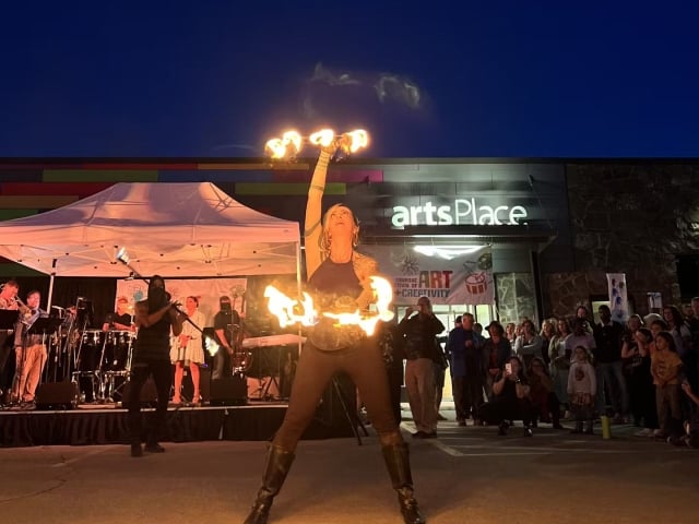 A person juggling with fire